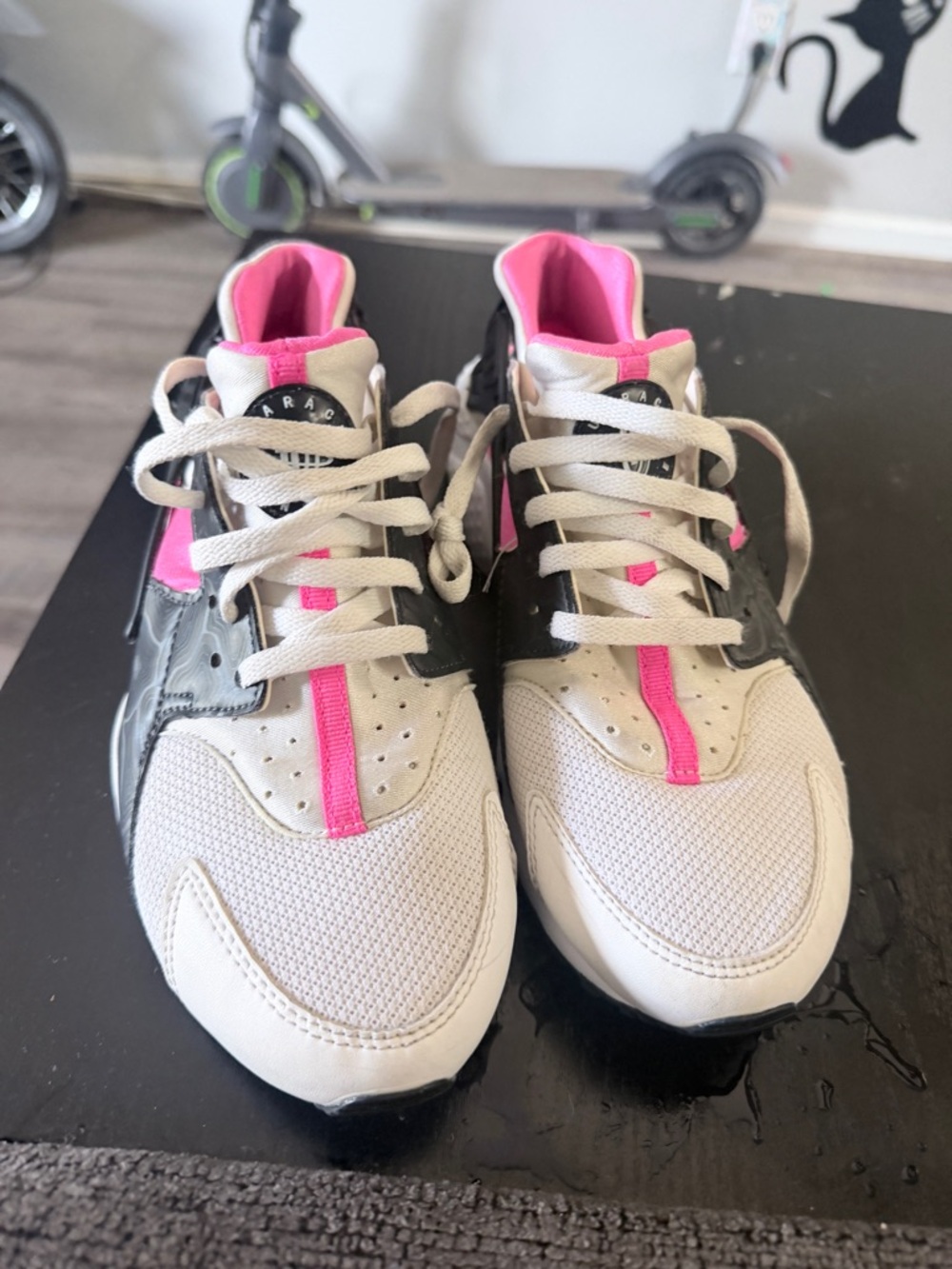Nike Air Huarache Run sneakers white, black, and hyper pink
